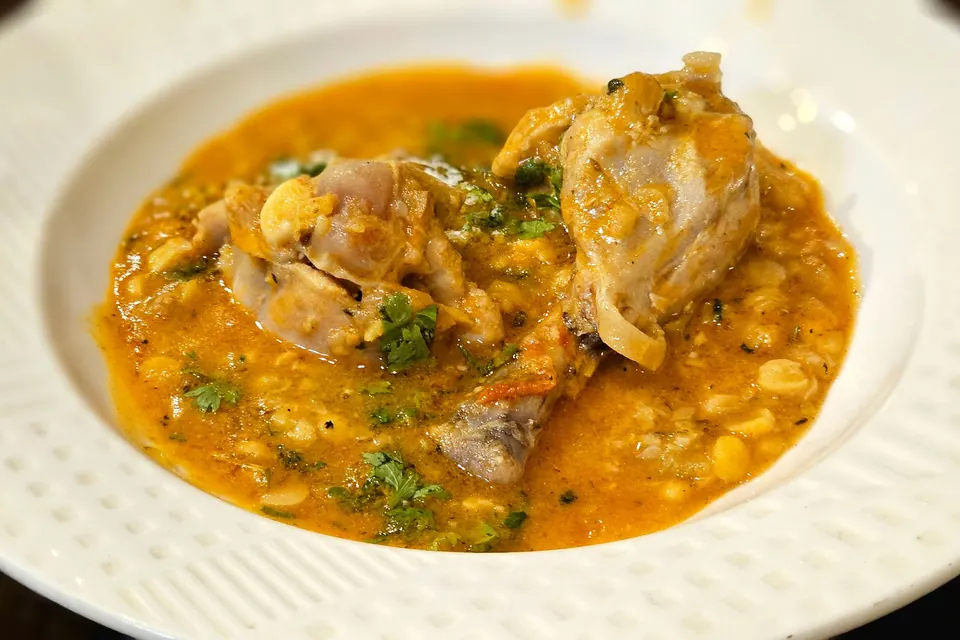 Dal chicken with a smoky onion tadka